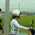 Scooter Safety:Can you tell what is wrong in this photo?She is wearing her helmet